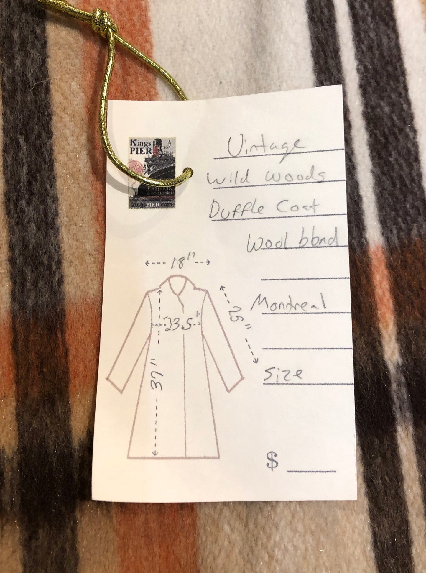 Kingspier Vintage - Wool blend coat (75% wool, 25% other) with fuzzy acetate lining, antler and leather toggle closures and front flap pockets.
Made in Canada.