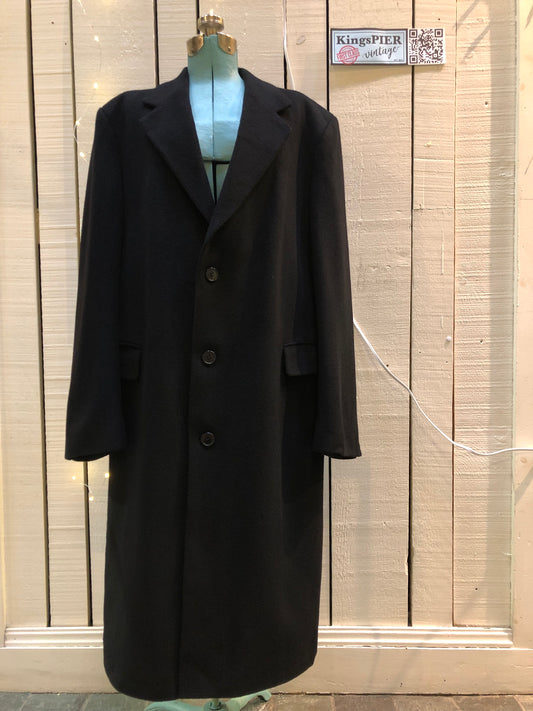 Kingspier Vintage - Vintage Baron Anderson long black coat with button closures and two flap pockets, Fibres unknown.
Made in Britain.