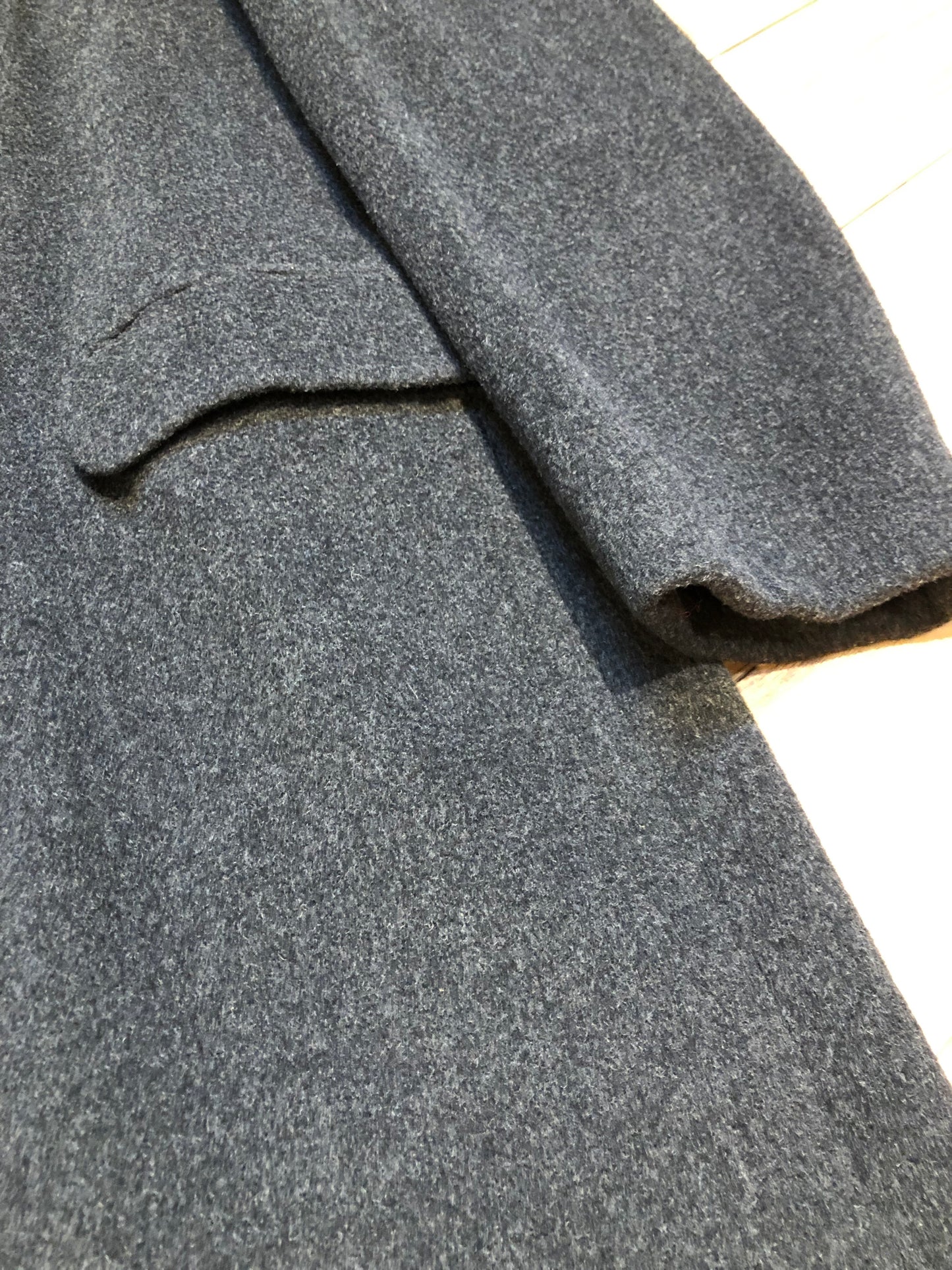 Kingspier Vintage - Vintage Adolfo 100% wool coat in charcoal grey, button closures and front flap pockets.
Size 42 Long.
Made in USA.