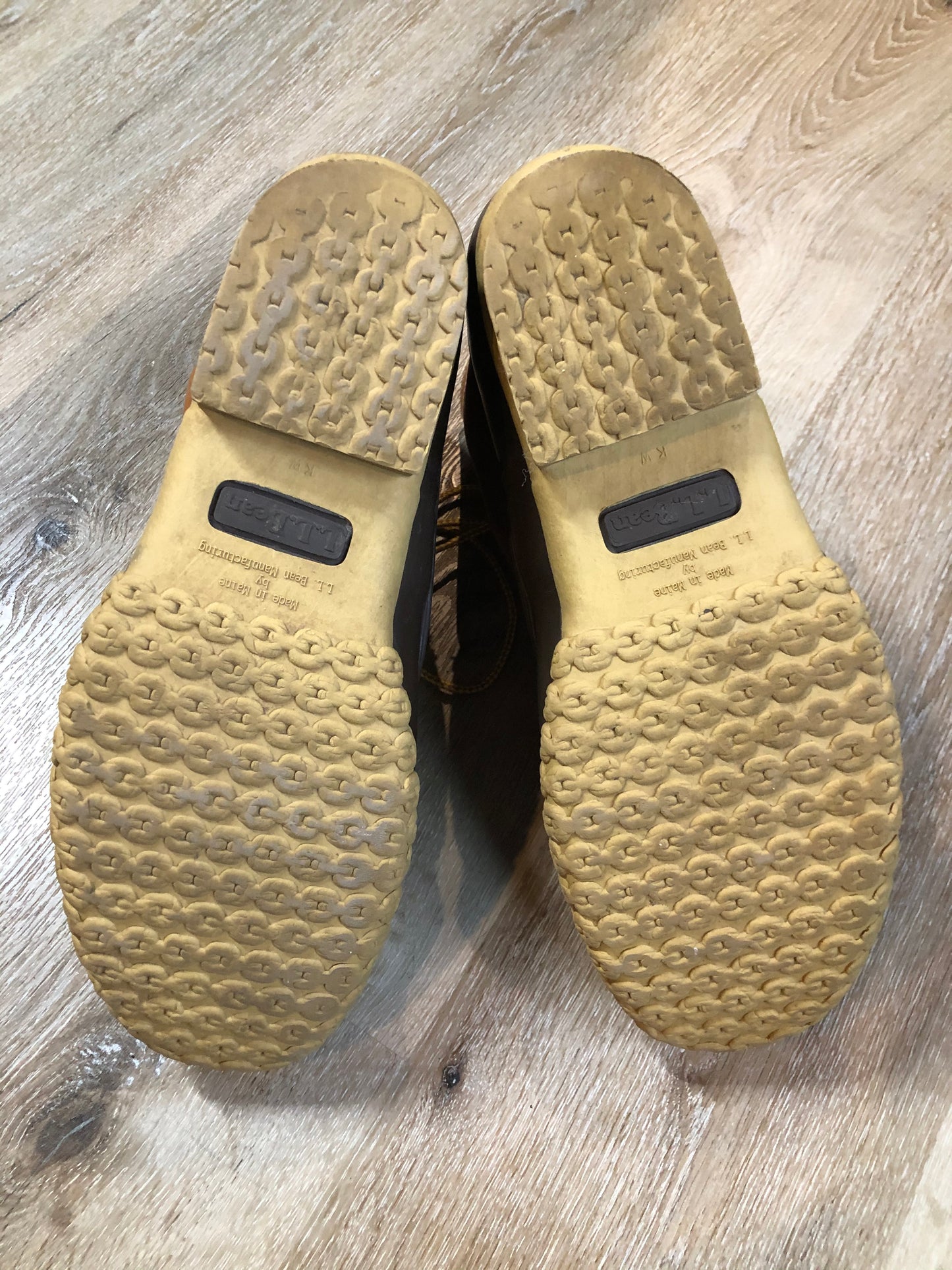 Vintage LL Bean “Bean Boots” or “Duck Boots” 6 eyelet lace up rain boot with full grain leather upper and a waterproof rubber covering the foot and a rubber chain-tread outsole. Made in Maine, USA.
Size 12 Mens
The uppers and soles are in excellent condition.