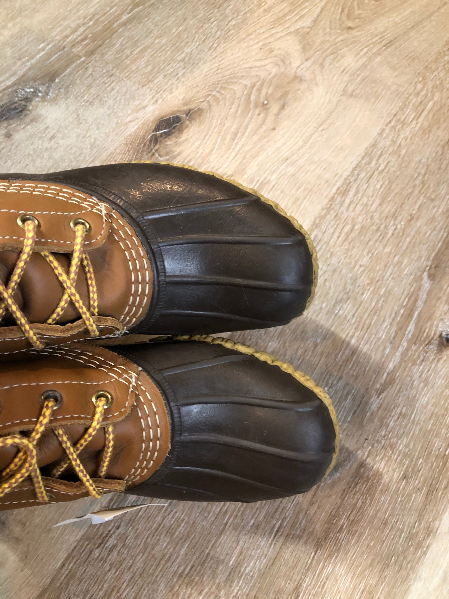 Vintage LL Bean “Bean Boots” or “Duck Boots” 6 eyelet lace up rain boot with full grain leather upper and a waterproof rubber covering the foot and a rubber chain- tread outsole. Made in Maine, USA.
Size 7.5 Womens
The uppers and soles are in excellent condition.