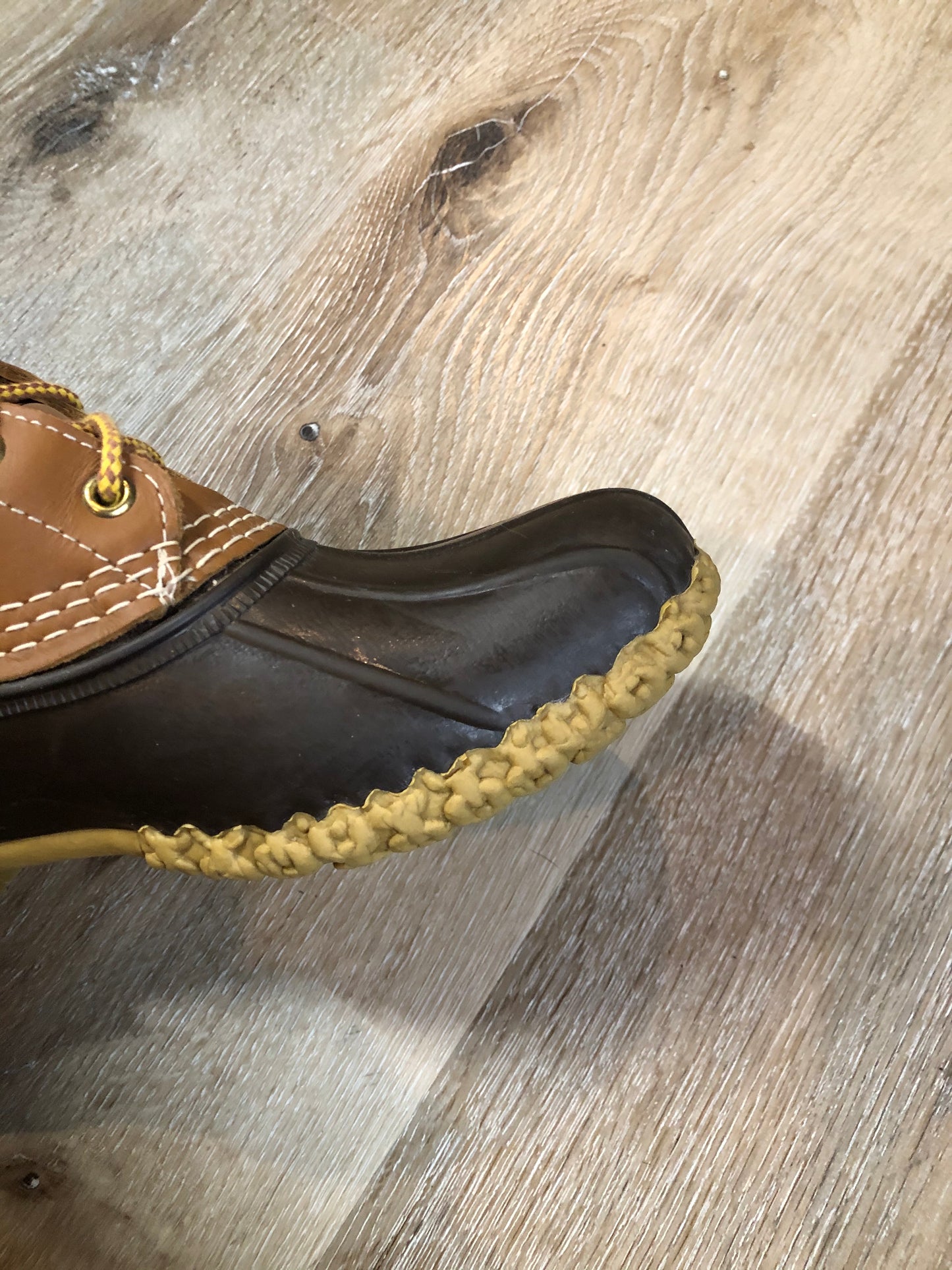 Vintage LL Bean “Bean Boots” or “Duck Boots” 6 eyelet lace up rain boot with full grain leather upper and a waterproof rubber covering the foot and a rubber chain- tread outsole. Made in Maine, USA.
Size 7.5 Womens
The uppers and soles are in excellent condition.