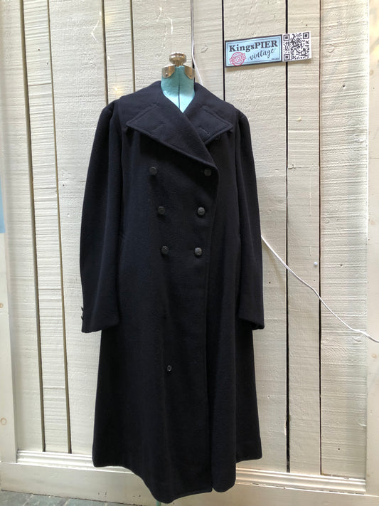 Kingspier Vintage - Rare Vintage 1940’s Bolter Bros Royal Canadian Sea Cadets double breasted long black wool coat. This coat features button closures, partial lining, two front pockets and two inside pockets. 
Size 2/ 5ft 8
Made in Canada.