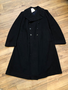 Kingspier Vintage - Rare Vintage 1940’s Bolter Bros Royal Canadian Sea Cadets double breasted long black wool coat. This coat features button closures, partial lining, two front pockets and two inside pockets. 

Size 2/ 5ft 8
Made in Canada.