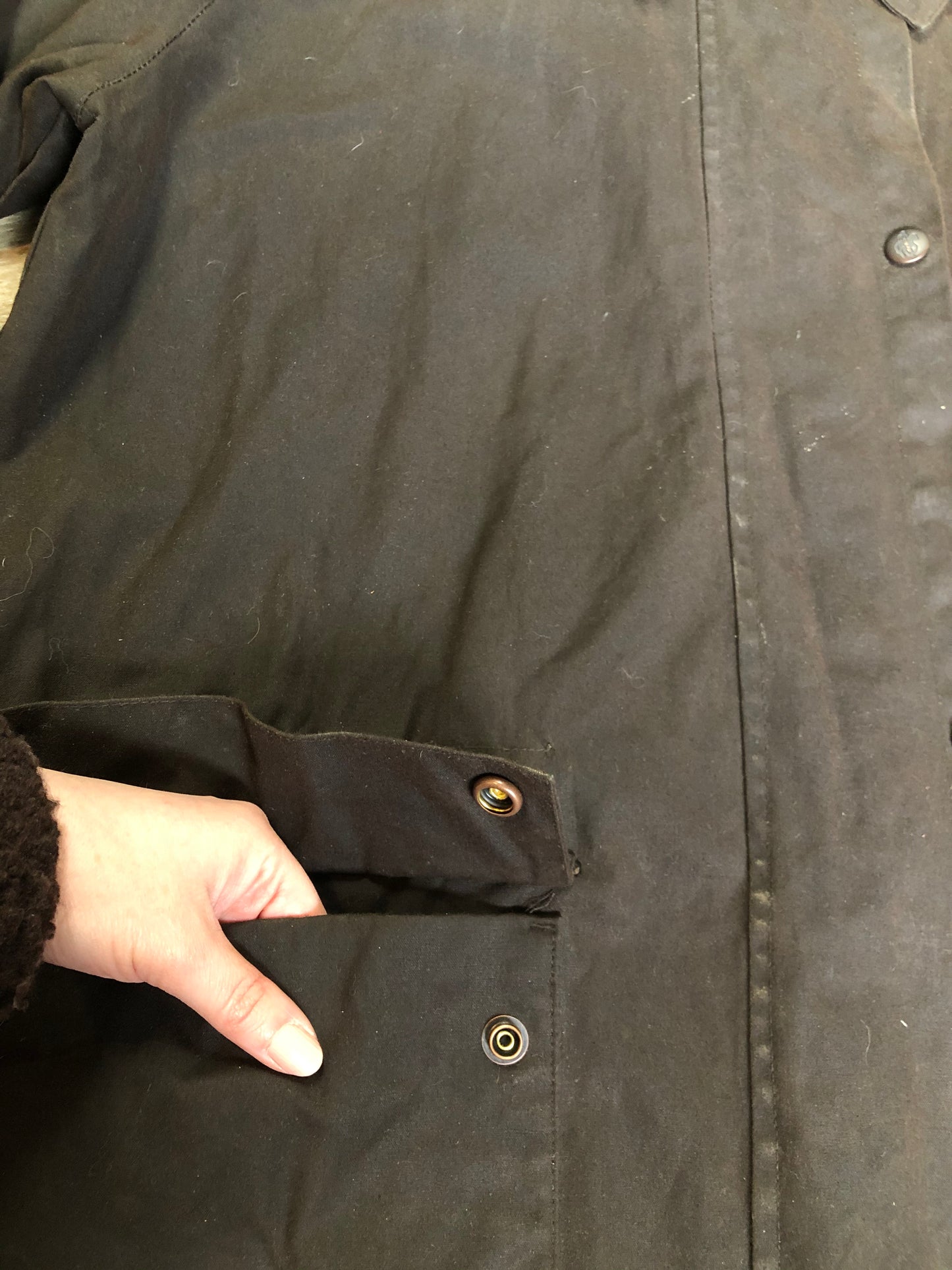 Kingspier Vintage - Outback Trading Co brown cotton oilskin rancher jacket with double snap closures, two snap flap pockets, one inside zip pocket, lightweight lining and drawstring at the waist. Fits large.