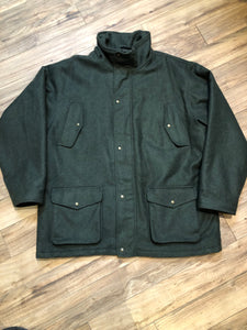 Kingspier Vintage - Cabela’s Dry Plus green 100% wool hunting jacket with snap and zipper closures, four front pockets and one back pocket.


Size 3XL Tall.