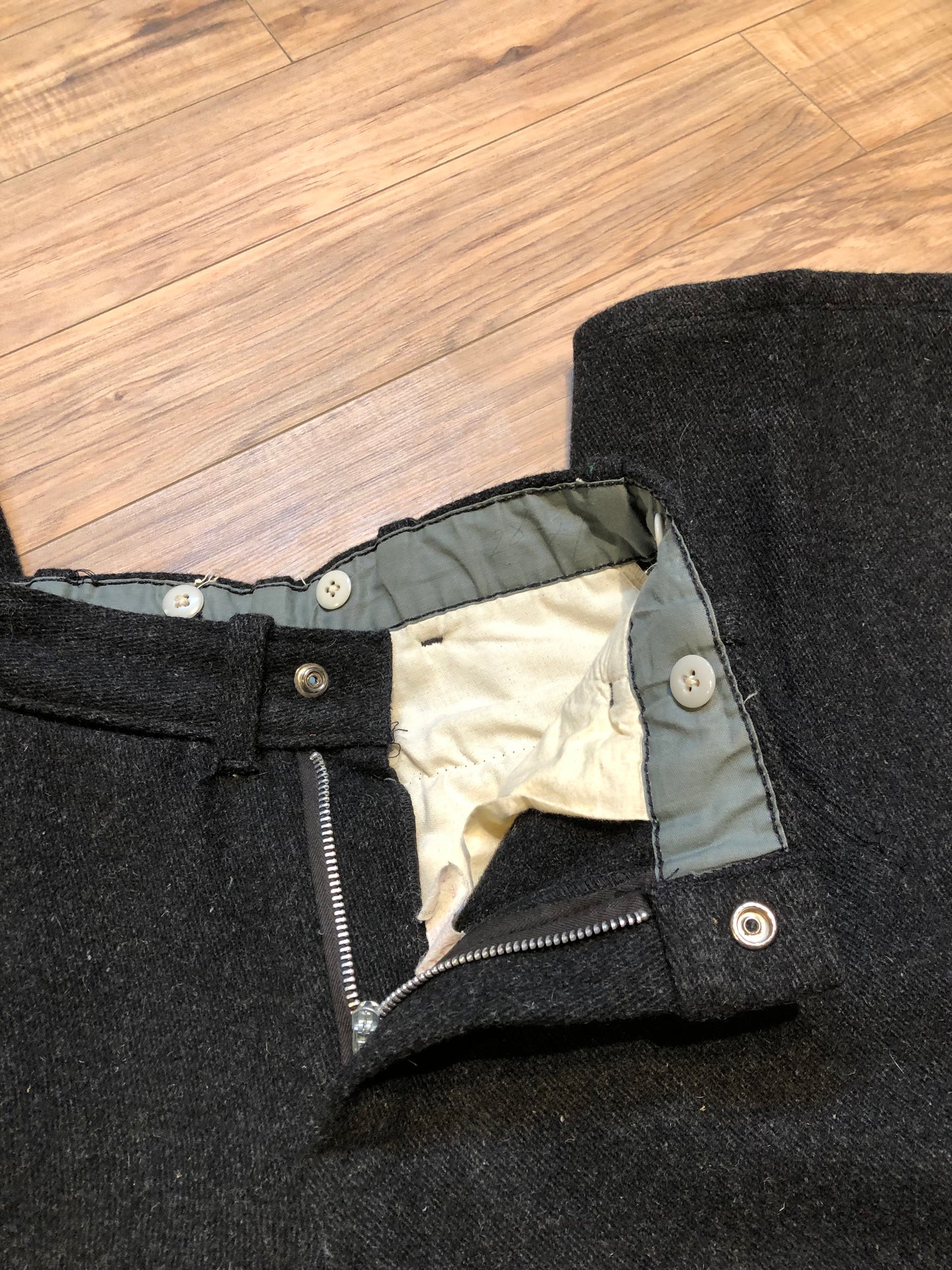 Kingspier Vintage - Vintage 1960’s Codet heavy weight wool pants in charcoal colour with zip fly and front and back pockets.
Made in Canada.