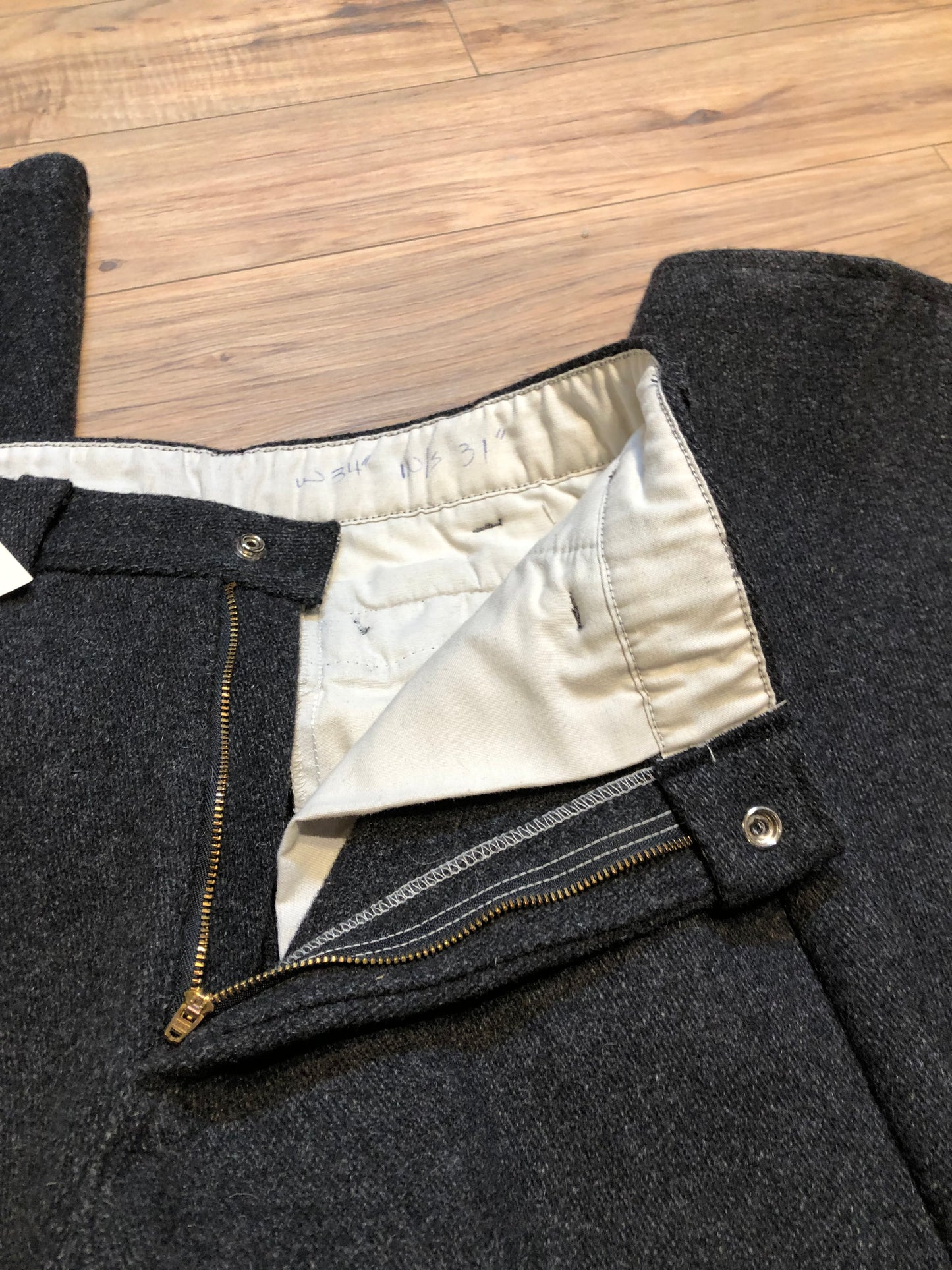 Kingspier Vintage - Vintage 1960’s Codet heavy weight wool pants in charcoal colour with zip fly and front and back pockets.
Made in Canada.