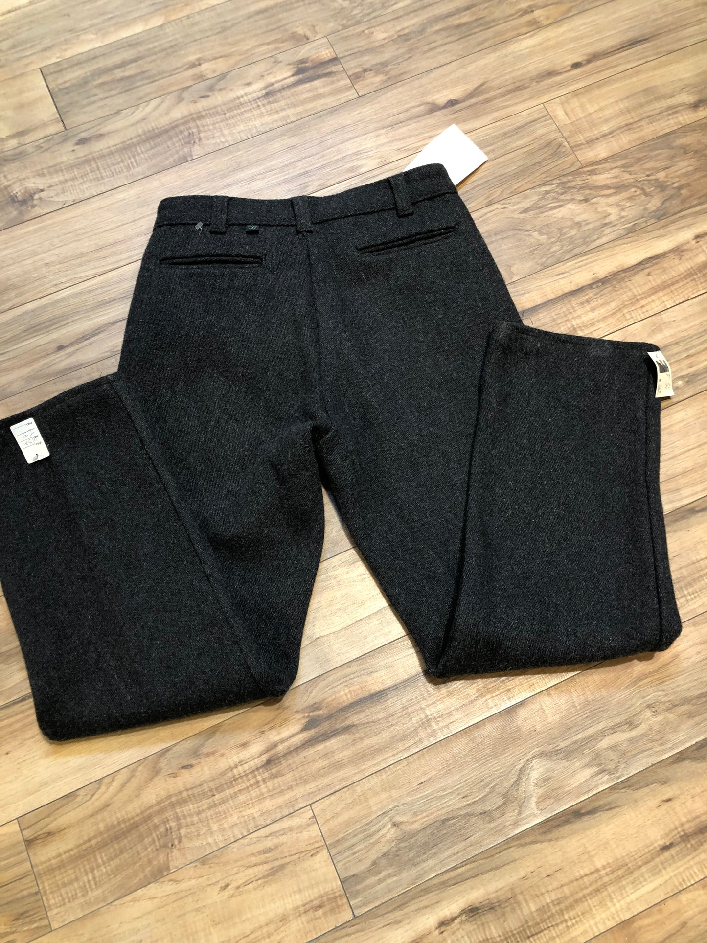 Kingspier Vintage - Vintage 1960’s Codet heavy weight wool pants in charcoal colour with zip fly and front and back pockets.
Made in Canada.