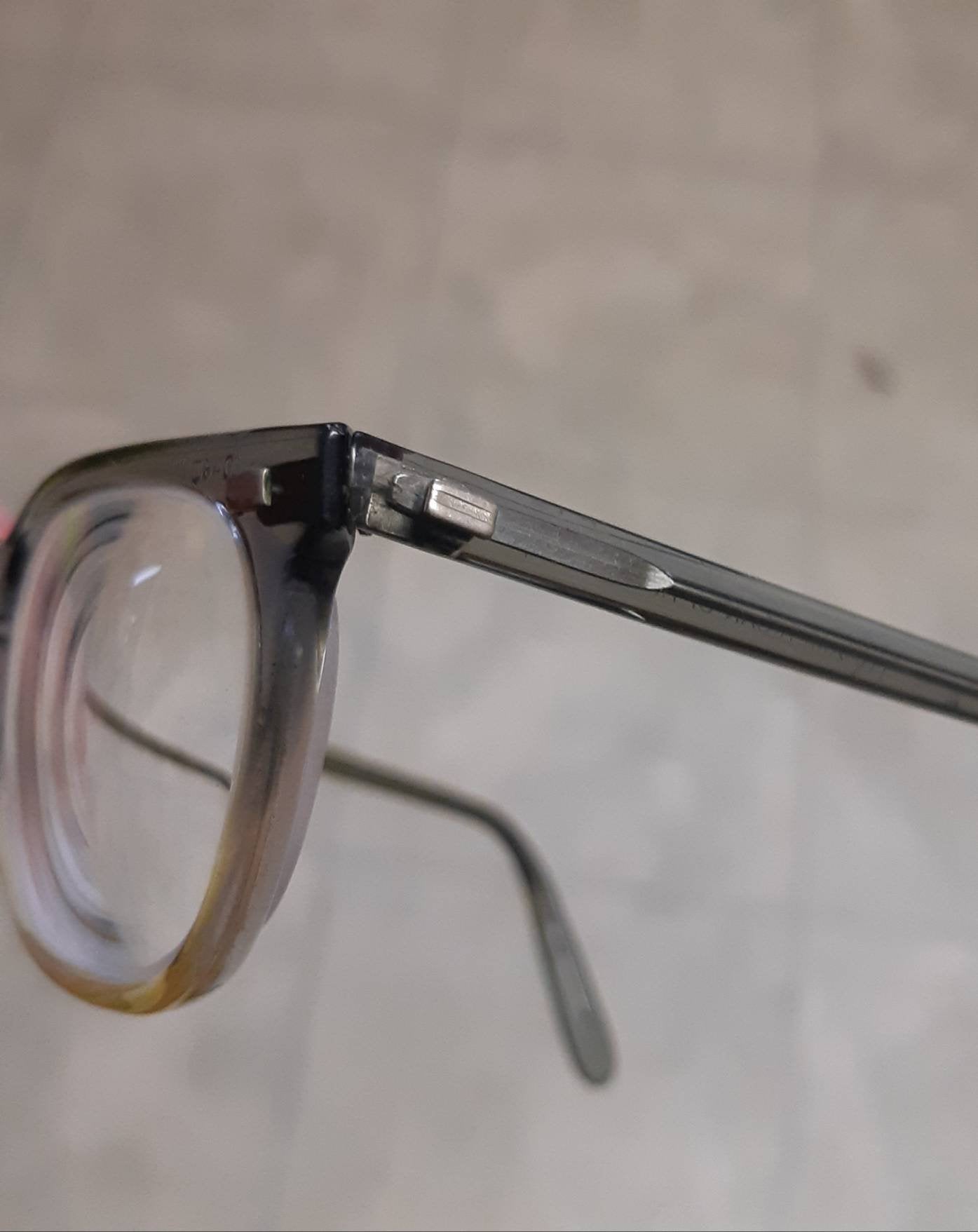 Rare 60's vintage American Optical translucent faded grey keyhole bridge eyeglasses, SOLD