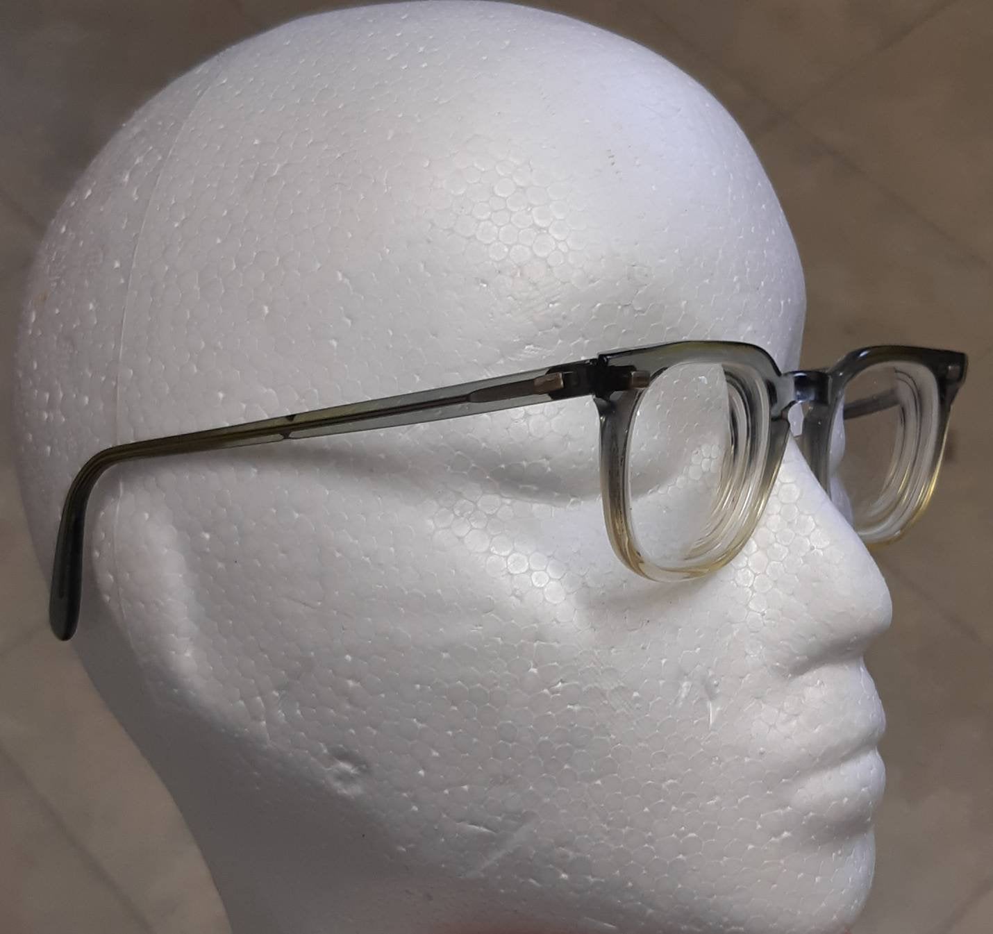 Rare 60's vintage American Optical translucent faded grey keyhole bridge eyeglasses, SOLD