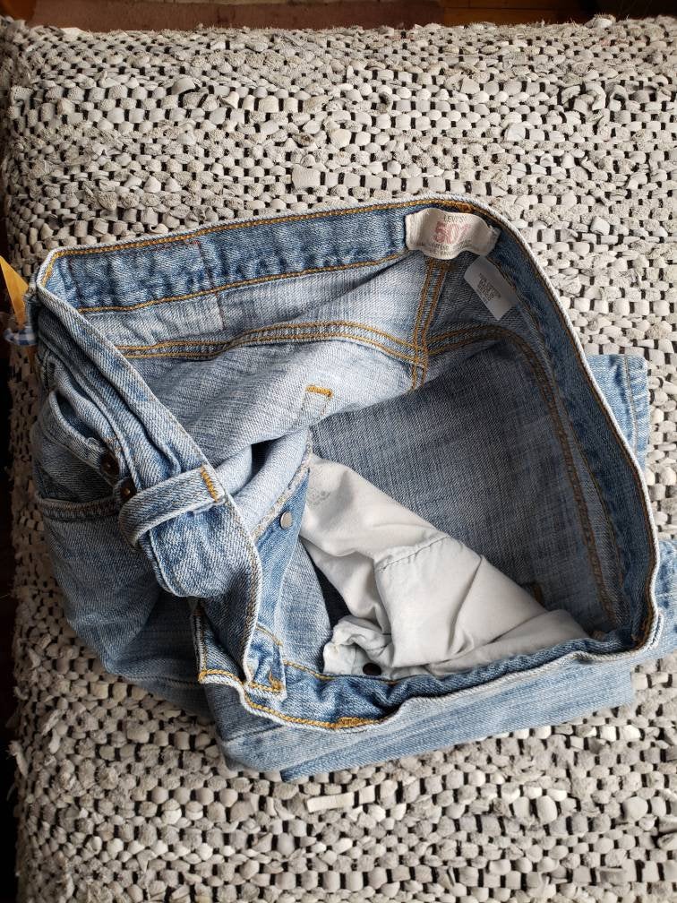 Kingspier Vintage - Classic vintage Levi's 501 button fly., 36"x32",
Made in Mexico, Very experienced with modest cuff wear, A faint rust stain midway back of right leg is pictured, Waist 36"
Rise 11.75", Inseam 31", Thigh 10.25", Hem width 8.75"
