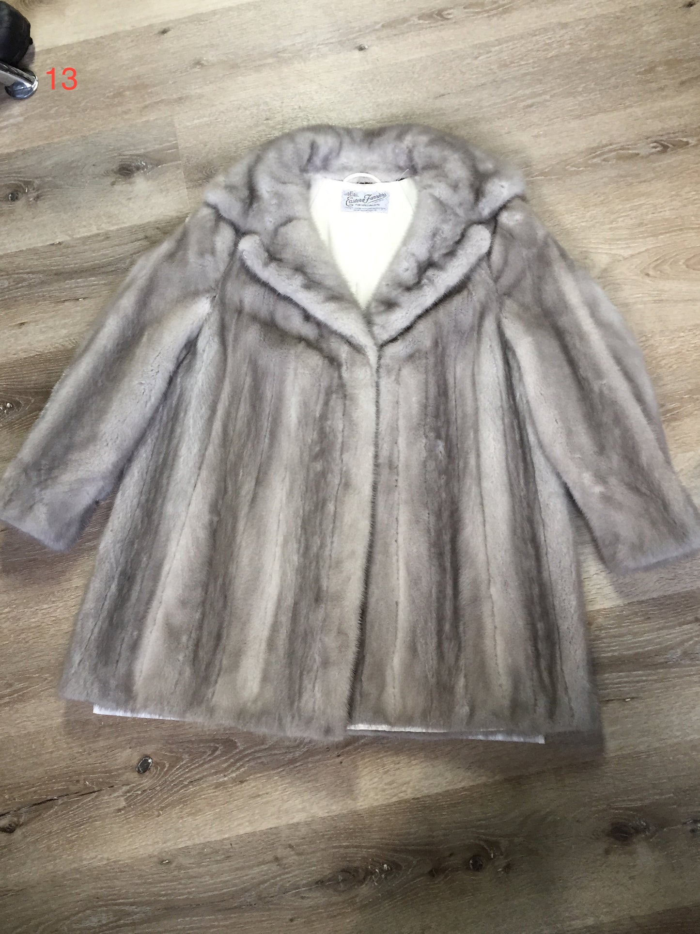 Kingspier Vintage - Eastern Furriers" Silver mink fur coat, Made in Canada. This coat features a white satin lining with inside pocket and embroidered monogram "BFD" and Eastern Furriers label.