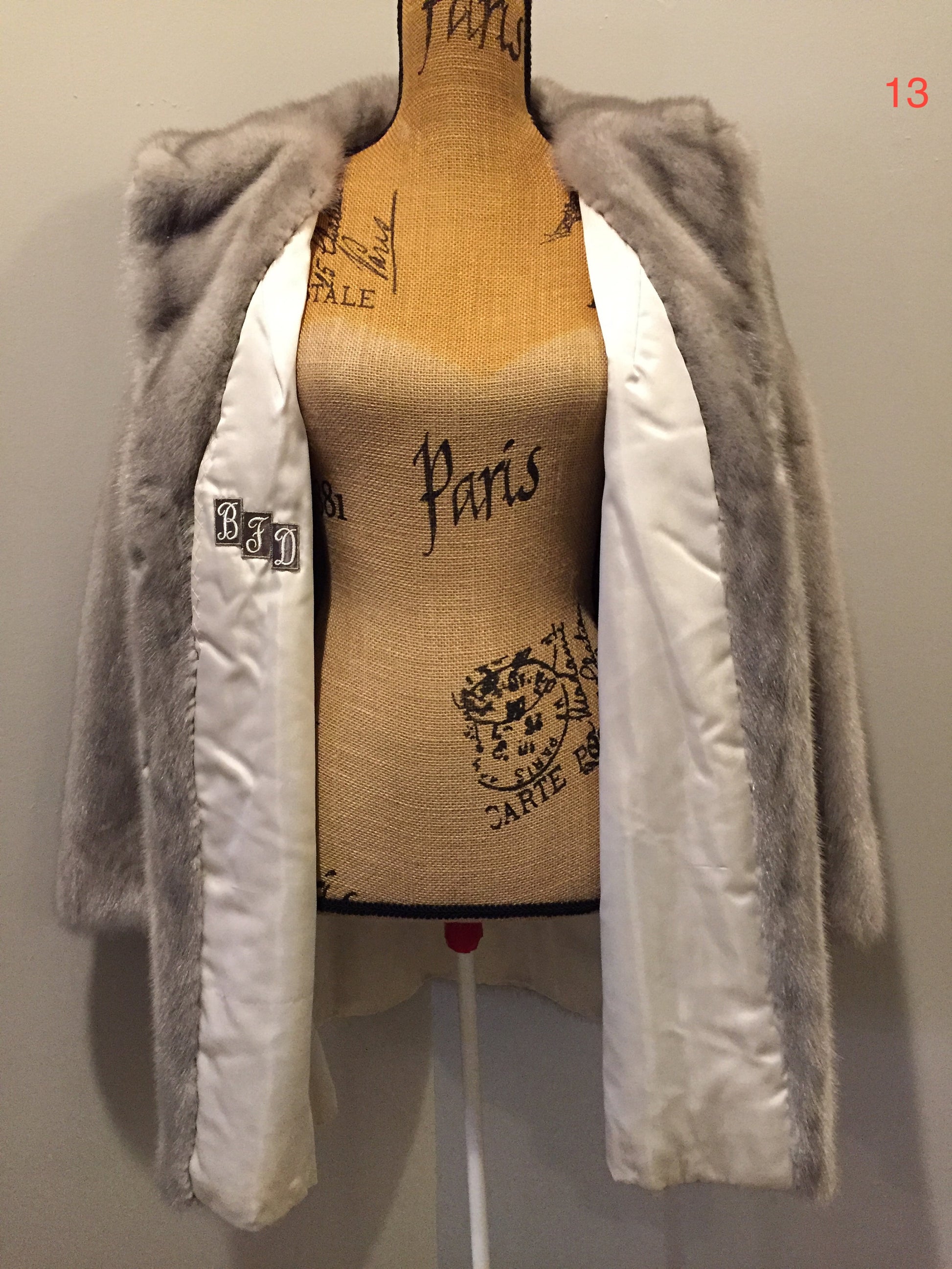 Kingspier Vintage - Eastern Furriers" Silver mink fur coat, Made in Canada. This coat features a white satin lining with inside pocket and embroidered monogram "BFD" and Eastern Furriers label.