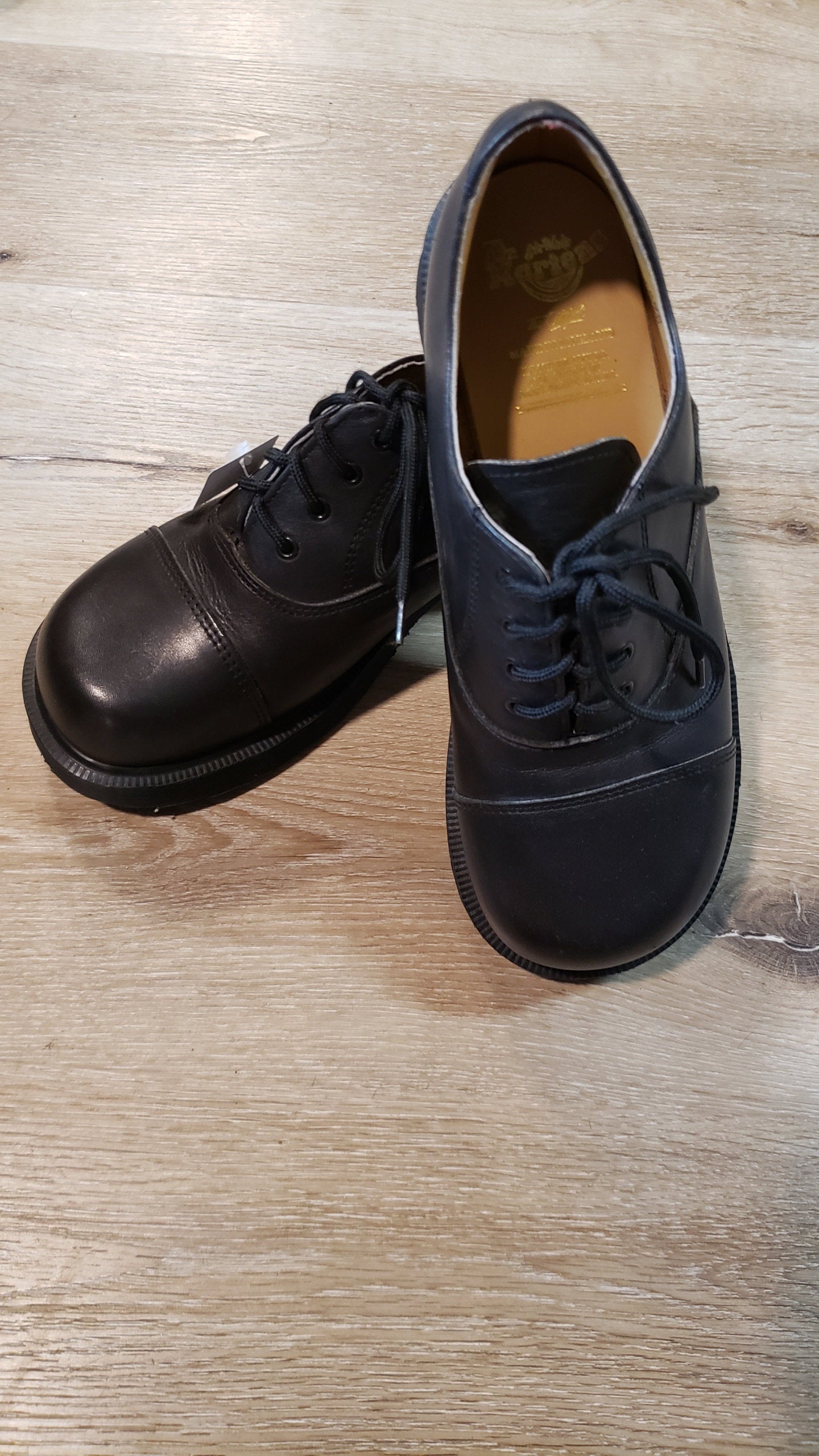 Kingspier Vintage - Brand new, made in UK! Black Doc Martens, heeled 70s style (more dramatic than the modern "Shriver" style.) Top of shoe hits at the ankle.
Size UK 6/ US W 8.5