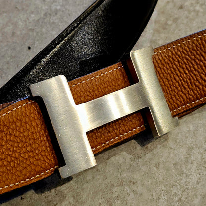 HERMÈS brushed silver tone belt buckle and reversible HERMÈS leather belt