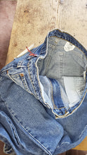 Load image into Gallery viewer, Vintage Levi&#39;s 521   31&quot;x33&quot;  (tag size  32/32)  high rise tapered leg  Vintage Red Tab  Made in CANADA 100% cotton  Excellent condition  button stamped # 217
