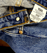 Load image into Gallery viewer, Vintage Levi&#39;s 521   31&quot;x33&quot;  (tag size  32/32)  high rise tapered leg  Vintage Red Tab  Made in CANADA 100% cotton  Excellent condition  button stamped # 217
