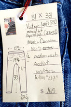Load image into Gallery viewer, Vintage Levi&#39;s 521   31&quot;x33&quot;  (tag size  32/32)  high rise tapered leg  Vintage Red Tab  Made in CANADA 100% cotton  Excellent condition  button stamped # 217
