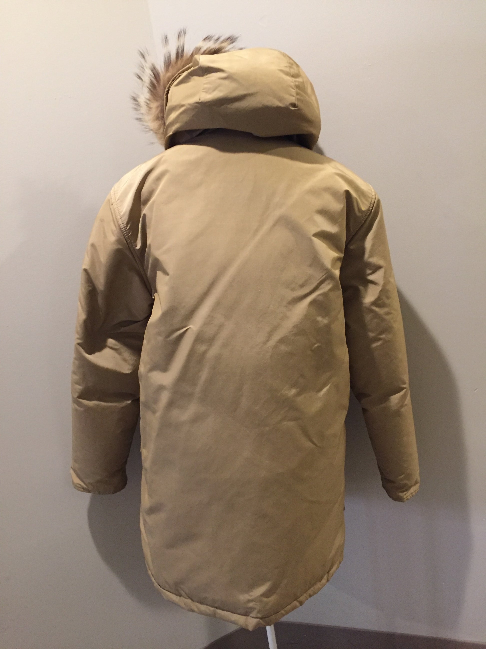 Kingspier Vintage - Woolrich goose down parka in beige with fur trimmed hood, slash pockets and flap pockets and inside pocket, zipper and button closures, Size small.