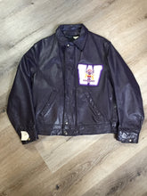 Load image into Gallery viewer, Kingspier Vintage - Western University leather varsity jacket in deep purple with slash pockets and snap closures, emblem embroidered on the chest and “Western” written across the back.
