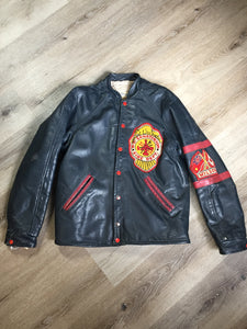 Kingspier Vintage - NS Sanitorium Fire Department green leather varsity jacket with red details, snap closures, slash pockets, embroidered emblem on the chest, embroidered monogram on the arm and shearling lining.
