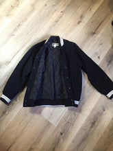 Load image into Gallery viewer, Kingspier Vintage - Retreat wool varsity jacket in black with ”Canada” printed on the chest,
