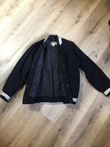 Kingspier Vintage - Retreat wool varsity jacket in black with ”Canada” printed on the chest,