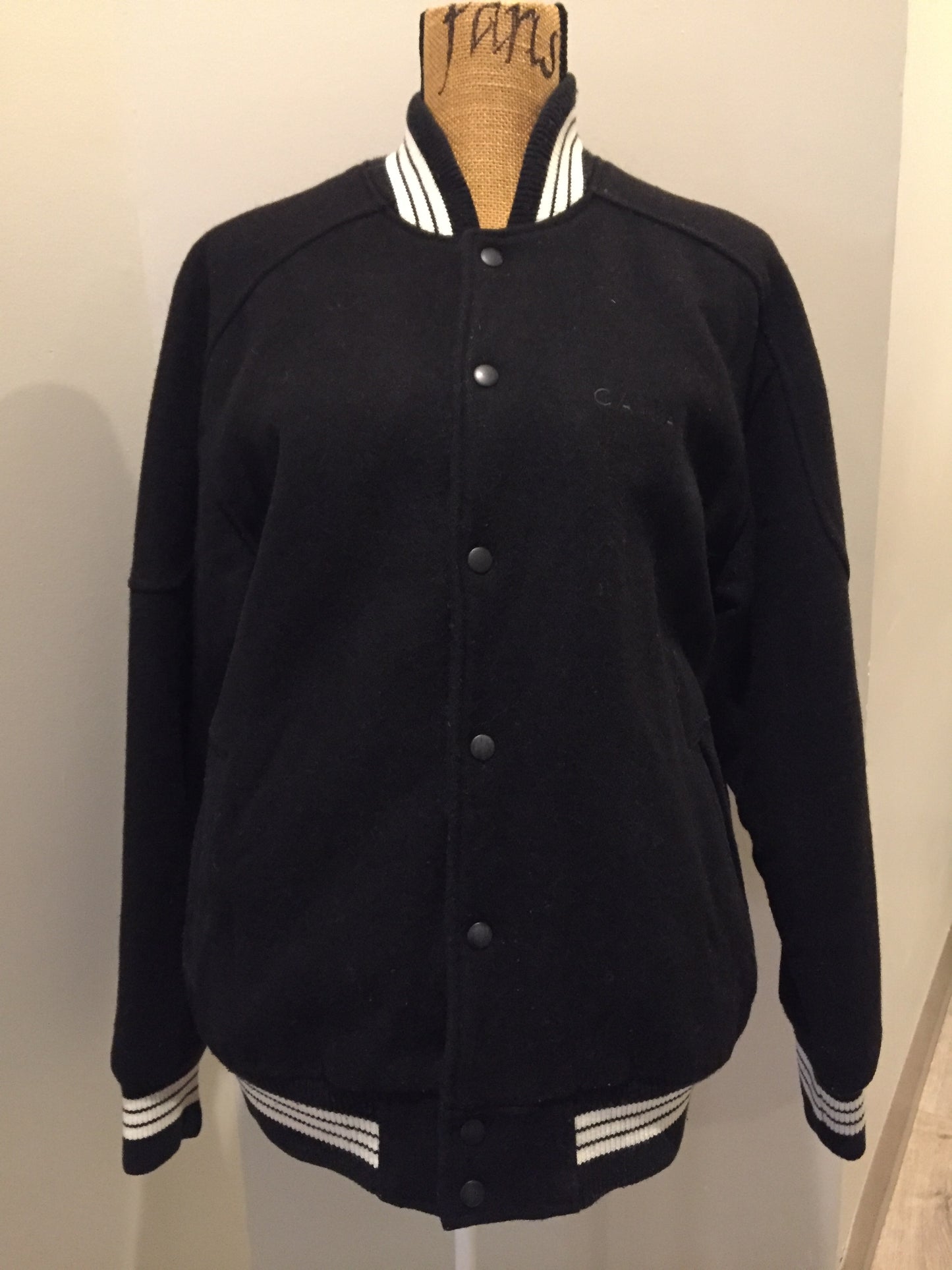 Kingspier Vintage - Retreat wool varsity jacket in black with ”Canada” printed on the chest,