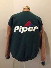 Load image into Gallery viewer, Kingspier Vintage - Piper leather/mouton varsity jacket in green and brown with “Aviation Limited” written on the chest and “Piper” written on the back, snap closures, slash pockets, quilted lining and inside pocket. Made in Canada.
