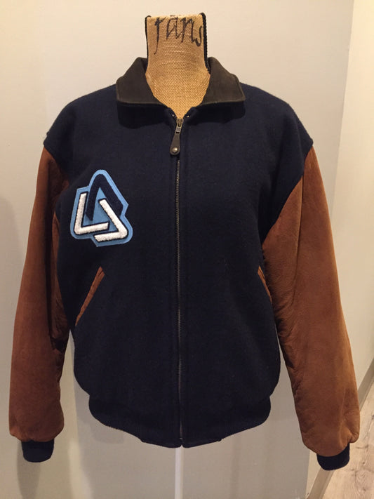 Kingspier Vintage - AES 1997 brown and blue leather and wool varsity jacket with zipper, slash pockets , quilted lining, inside pocket, embroidered emblem on the chest and “AES” printed across the back.