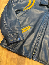 Load image into Gallery viewer, Bonwitt of Winnipeg blue and yellow leather varsity jacket.

Jacket features a zipper closure, two front pockets and a quilted lining.

Made in Canada.
Size XL
