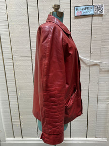 Vintage 70’s Ottawa 67s Red Leather Varsity Jacket by Rolly Sarault.

Jacket features embroidered details on the chest, snap closures, quilted lining and two front pockets.

Made in Canada.
Chest 46”.
