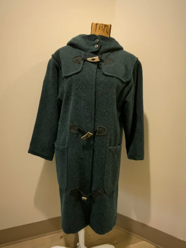Kingspier Vintage - “The Woolrich Woman” dark teal wool and mohair blend duffle coat with hood, pockets, three wooden toggles, inside snaps and a leather Woolrich label. Made in the USA. Fits a size small.