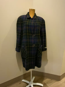 Kingspier Vintage - This coat features a striking colour combination of royal blue, green, yellow, red and black plaid. It is a wool blend shell with button closures, front pockets and bright orange lining. It fits a size large.
