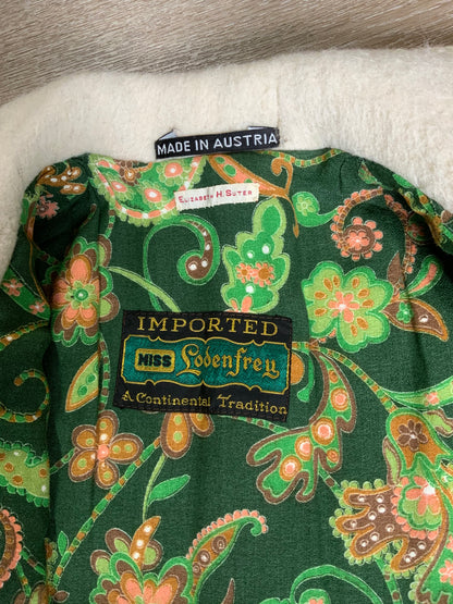 Kingspier Vintage - Miss Lodenfrey white Australian wool coat with lovely braided trim detailing, double breasted with button closures and front pockets. This coat features a bright green paisley lining. Made in Austria. Size small.