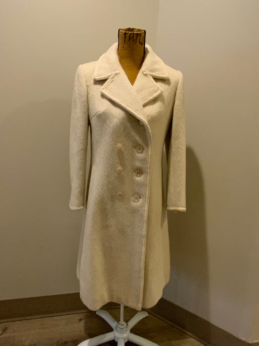 Kingspier Vintage - Miss Lodenfrey white Australian wool coat with lovely braided trim detailing, double breasted with button closures and front pockets. This coat features a bright green paisley lining. Made in Austria. Size small.