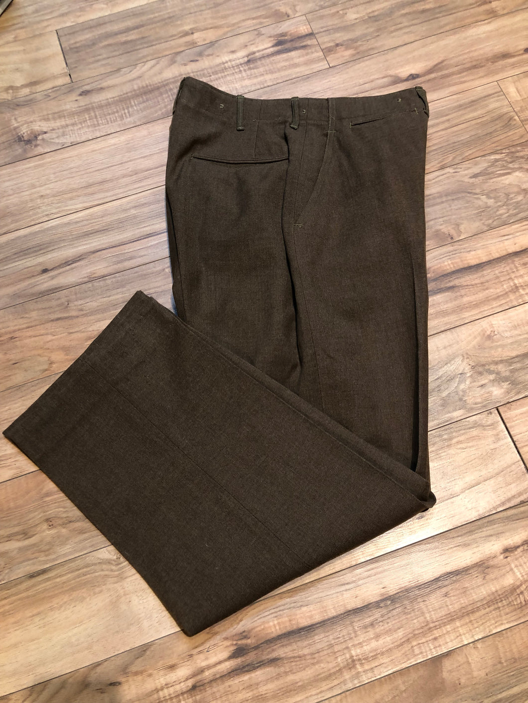 Kingspier Vintage - Vintage 1945 US Army Issue Wool Field Trousers with button fly, straight leg and front and back pockets.

Made in USA.