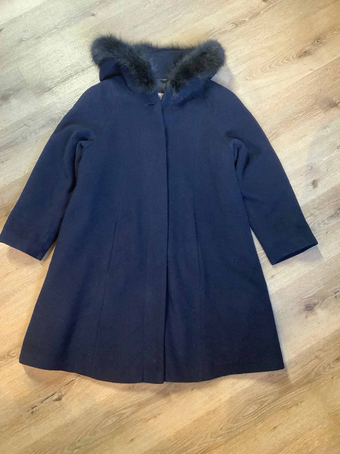 Kingspier Vintage - Braemar Petites by Jeremy Scott 1980’s/ 1990’s wool blend coat in navy blue with synthetic fur trim around the hood. Features hidden button closures down the front and slash pockets. Made in Romania