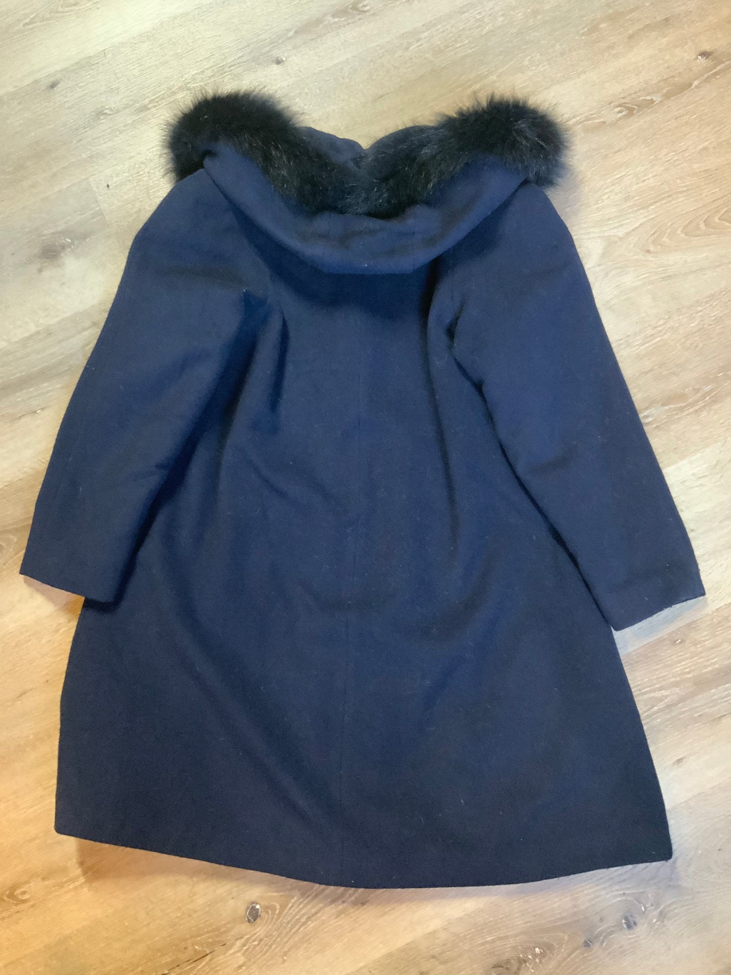 Kingspier Vintage - Braemar Petites by Jeremy Scott 1980’s/ 1990’s wool blend coat in navy blue with synthetic fur trim around the hood. Features hidden button closures down the front and slash pockets. Made in Romania