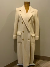 Load image into Gallery viewer, Kingspier Vintage - Raffinati 1980’s double breasted wool blend coat in cream. This coat features unique gold buttons in front, front pockets and a belt in the back. Fits a size 8.
