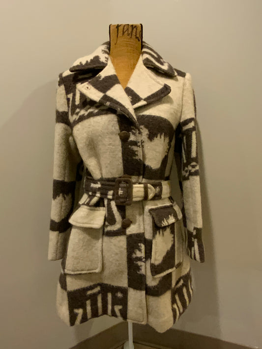 Kingspier Vintage - Icewool 100% pure virgin wool coat. Brown and cream pattern with belt, wooden buttons and a top snap closure. Made in Iceland. Fits size 14.