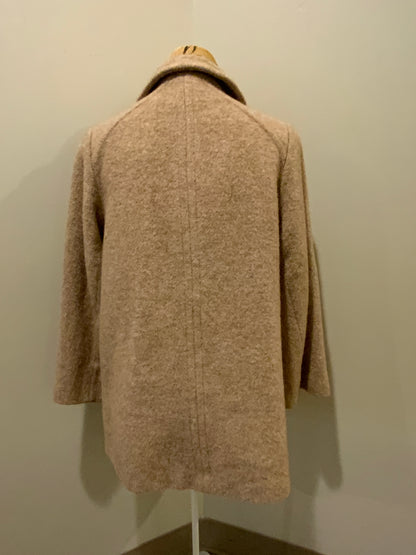 Kingspier Vintage - D’allavid’s beige/pink wool car coat with pink front buttons and welt pockets. Made in Canada. Fits a size small.