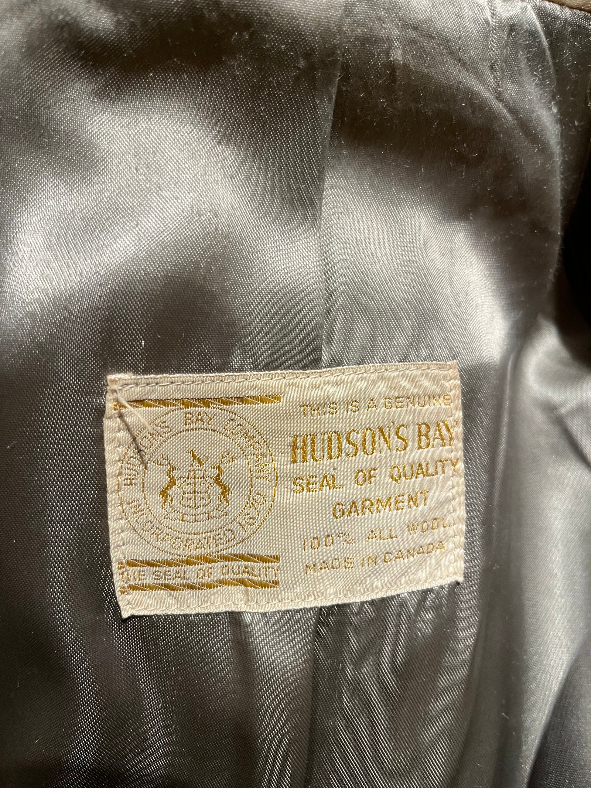 Genuine 1960’s Hudson’s Bay Company 100% wool point blanket coat in the iconic multi-stripe colours. The coat features flap pockets and hand warmer pockets, double breasted button closures and belt. 

Made in Canada. 
Chest 40”