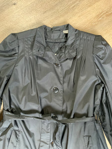 Kingspier Vintage - J.Gallery Petite water repellent black single breasted trench coat with belt, button closures, welt pockets. pleated detail in shoulders and zip out quilted lining. Size 12 petite.