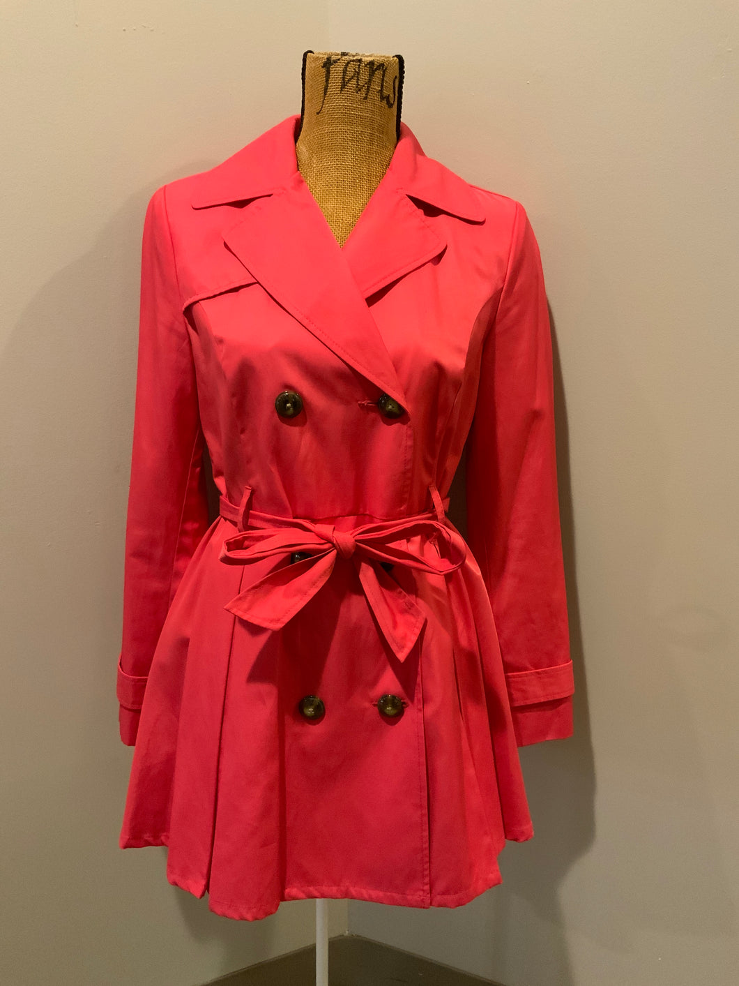 Kingspier Vintage - Black Rivet bright pink double breasted trench coat with belt, welt pockets, pleated skirt and vibrant flower motif lining. Size small.
