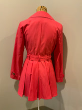 Load image into Gallery viewer, Kingspier Vintage - Black Rivet bright pink double breasted trench coat with belt, welt pockets, pleated skirt and vibrant flower motif lining. Size small.
