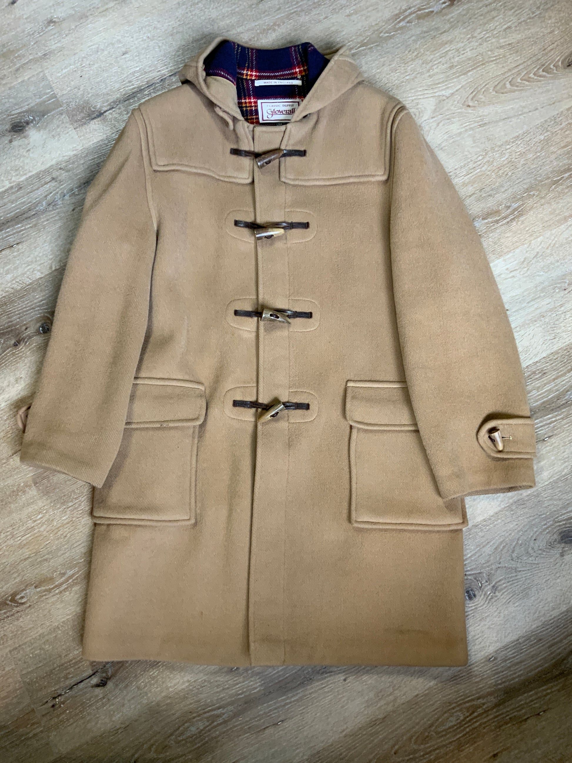 Kingspier Vintage - Gloverall Tan wool blend coat with hood, zipper, flap pockets and plaid lining. Made in England. Size 40. 