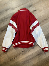 Load image into Gallery viewer, Kingspier Vintage - EIS red letterman’s jacket with white leather arms, race flag embroidered emblem, snap closures and slash pockets. Size large.
