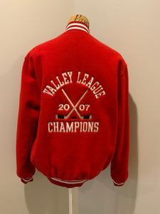 Kingspier Vintage - Melrose Youth Hockey letterman’s jacket in red with white accents, embroidered emblem on the front and lettering on the back with monogram on shoulder “Kevin”. Snap closures, slash pockets. Made in the USA. Size M.